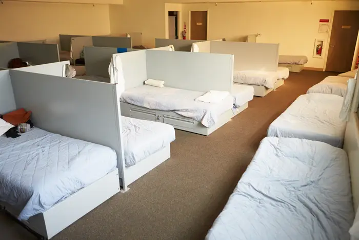 A stock photo of empty shelter beds